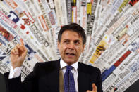 Italian Premier Giuseppe Conte answers reporters' questions during a press conference at the foreign press club in Rome, Monday, Oct. 22, 2018. (AP Photo/Gregorio Borgia)