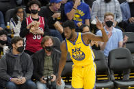 Golden State Warriors forward Andrew Wiggins (22) celebrates after scoring against the Minnesota Timberwolves during the second half of an NBA basketball game in San Francisco, Thursday, Jan. 27, 2022. (AP Photo/Jeff Chiu)