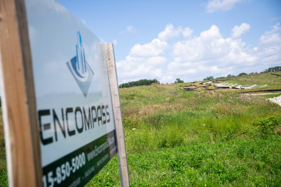 A tract near Des Moines University in West Des Moines where developer Daniel Pettit proposed to build an extensive community sits empty.  A loan for the project is now in foreclosure.