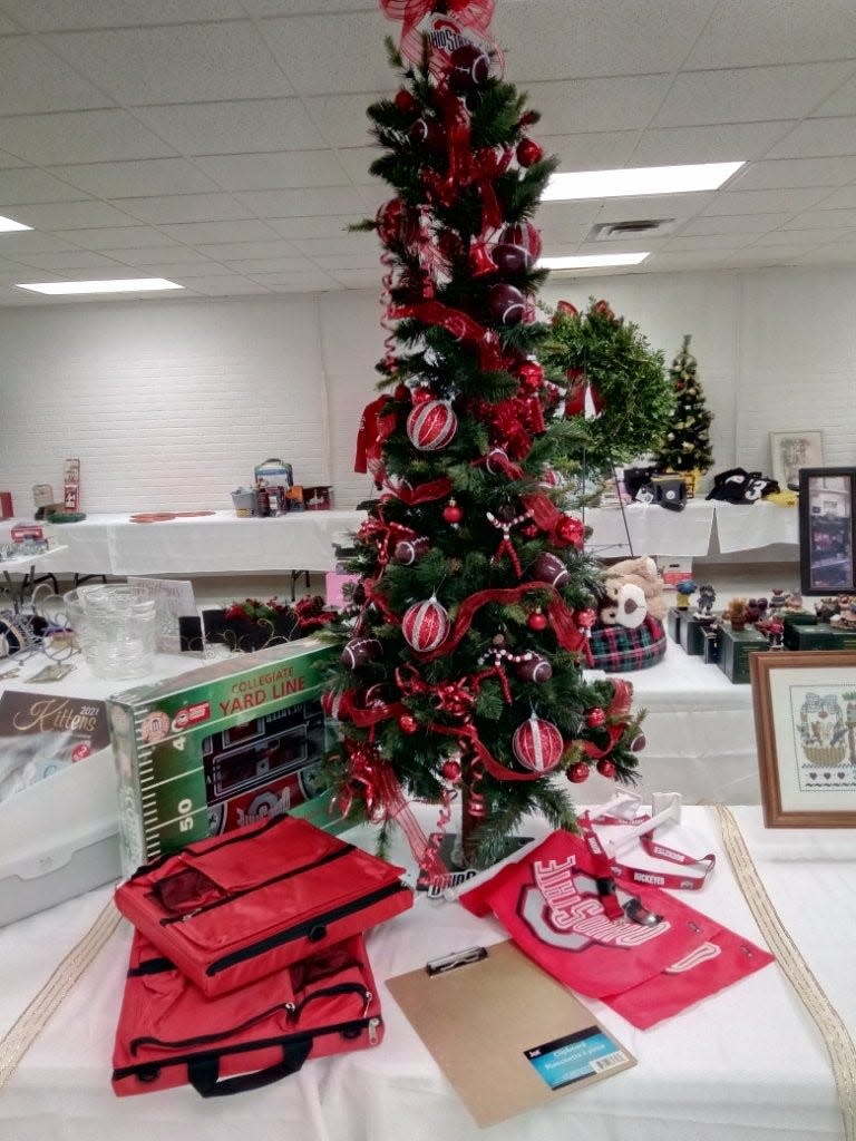 An Ohio State Christmas tree and other university memorabilia will be available during Saturday's annual auction for PAWS.