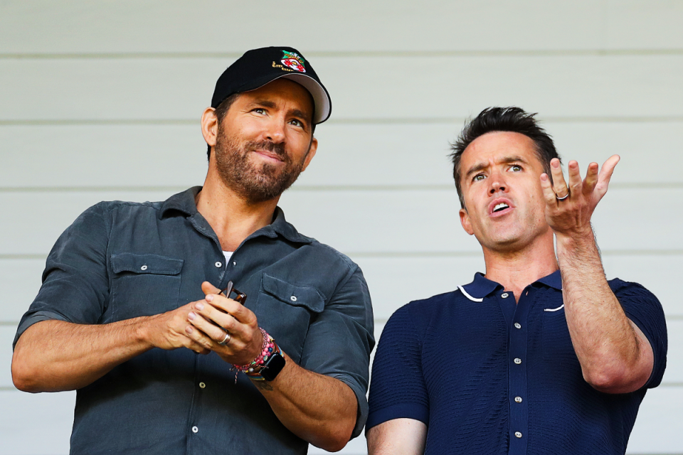 Reynolds and McElhenney watch on at Wrexham’s Racecourse Ground (Getty)