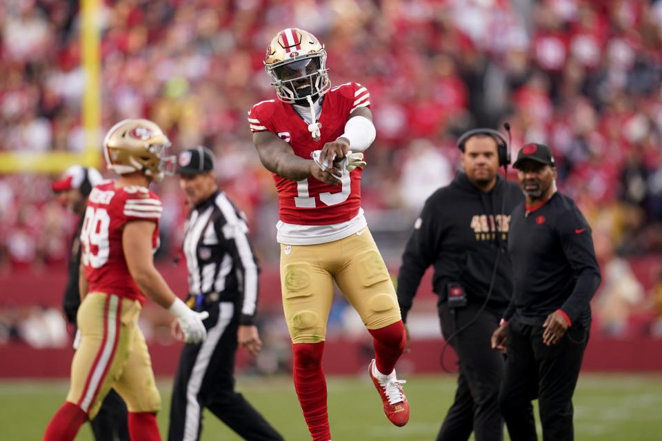 Dec 10, 2023; Santa Clara, California, USA; San Francisco 49ers wide receiver Deebo Samuel (19) jumps in the air during a break in the action against the Seattle Seahawks in the fourth quarter at Levi’s Stadium. Mandatory Credit: Cary Edmondson-USA TODAY Sports