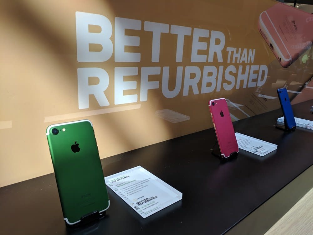 These refurbished iPhones were among the many low-cost handsets at Mobile World Congress. (image: Rob Pegoraro)