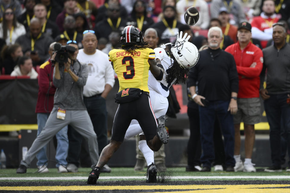 Penn State wide receiver Dante Cephas, center right, catches a touchdown pass against Maryland defensive back Ja'Quan Sheppard (3) during the first half of an NCAA college football game, Saturday, Nov. 4, 2023, in College Park, Md. (AP Photo/Nick Wass)