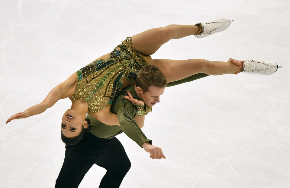 Madison Chock and Evan Bates of the USA perform during the Ice Dance-Free Dance at the Figure Skating World Championships in Stockholm, Sweden, Saturday, March 27, 2021. (AP Photo/Martin Meissner)