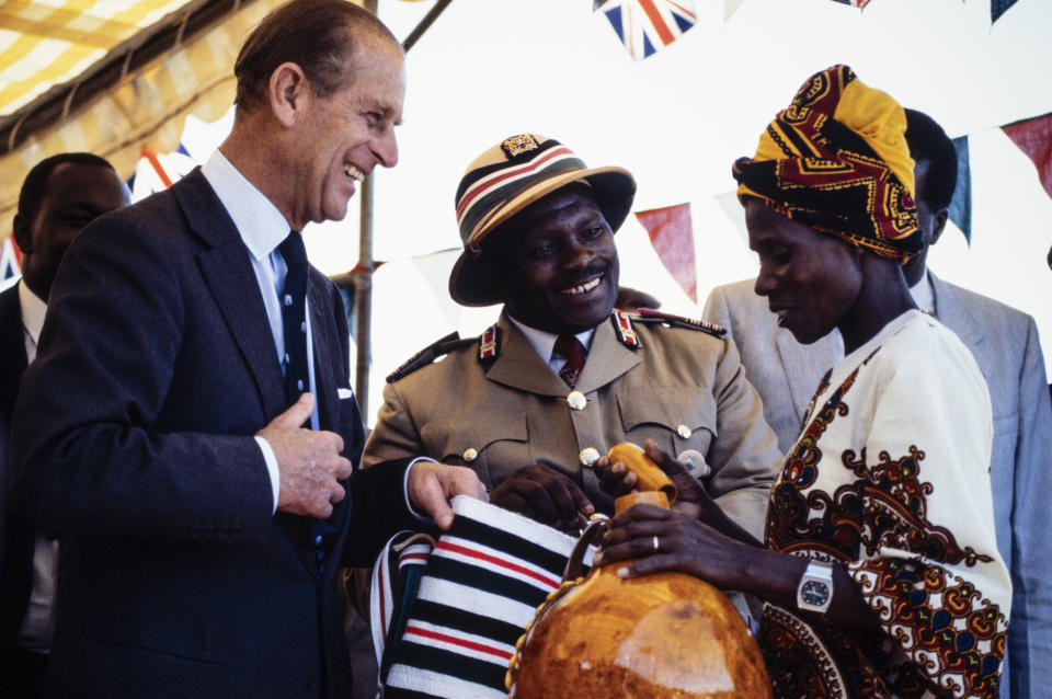 KENYA - NOVEMBER 12: Prince Philip, Duke of Edinburgh, receives a gift on November 12, 1983 in Kenya. Queen Elizabeth II And Prince Philip, Duke of Edinburgh are on a Royal Tour of Kenya. (Photo by David Levenson/Getty Images)