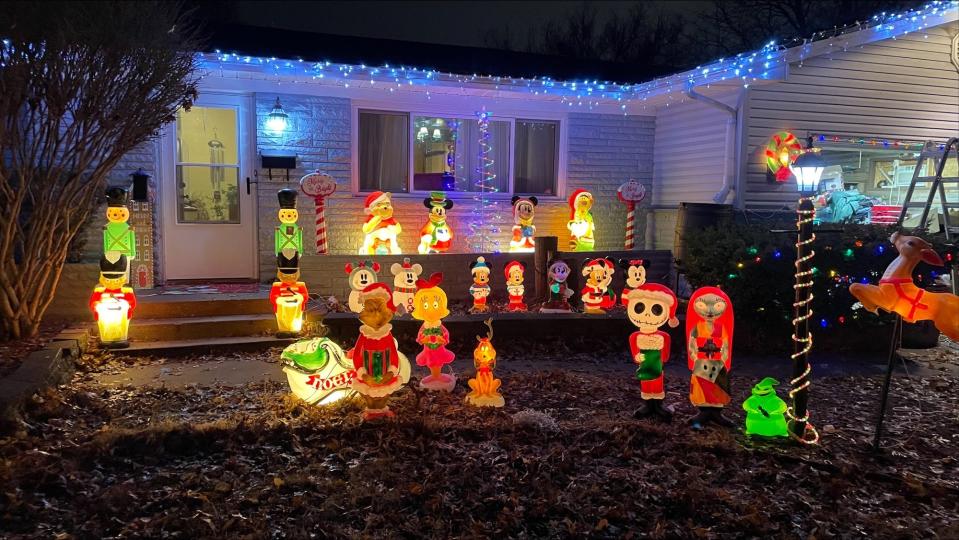 Bob Graham has over 80 blowup molds in this front yard as a tribute to his two grandchildren, Graham and Harper, who have passed away. His decorations are located at 1953 S. Meadowview Ave.