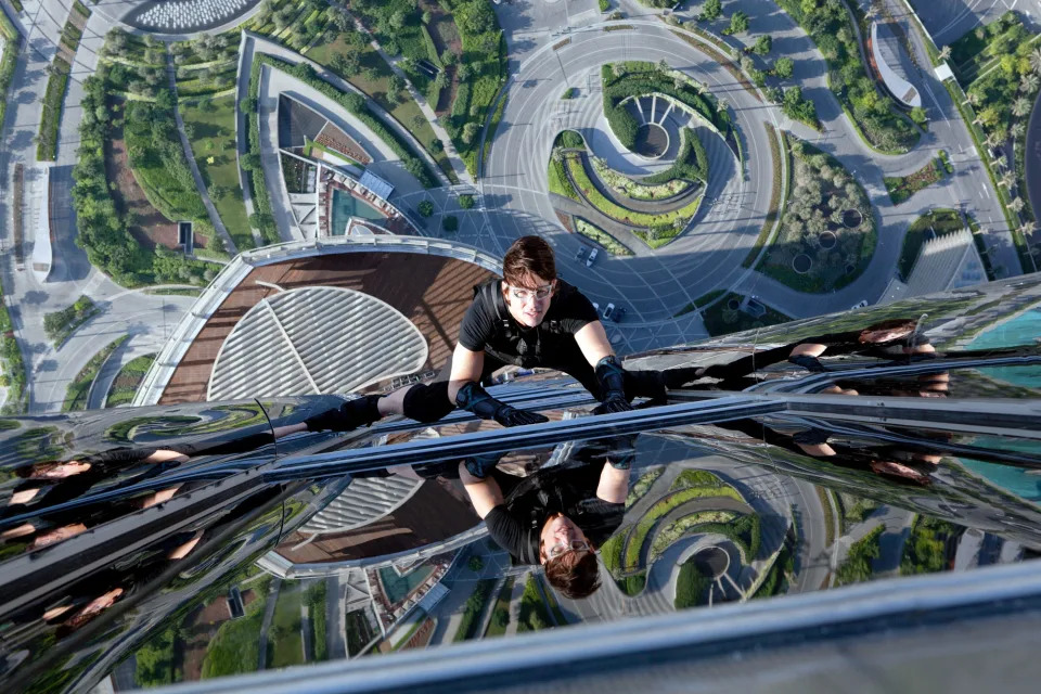 Cruise scaling the Burj Khalifa in Ghost Protocol (Photo:  Tom Cruise, 2011, ph: David James/©Paramount Pictures/courtesy Everett Collection)