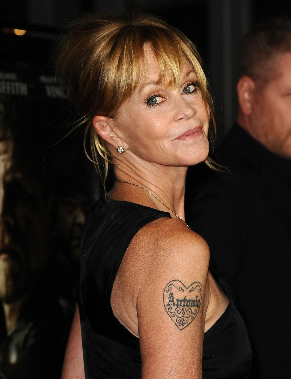 Closeup of Melanie Griffith's tattoo