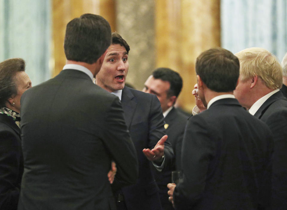 Britain's Princess Anne The Princess Royal, left, talks to NATO delegates from left, Nato Secretary General Jens Stoltenberg, Canadian Prime Minister Justin Trudeau, French President Emmanuel Macron and Britain's Prime Minister Boris Johnson, during a reception at Buckingham Palace, in London, as Nato leaders attend to mark 70 years of the alliance, Tuesday Dec. 3, 2019. While NATO leaders are publicly professing unity as they gather for the London summit, several seem to have been caught in an unguarded exchange on camera apparently gossiping about U.S. President Donald Trump’s behaviour. In footage recorded during the Buckingham Palace reception on Tuesday, Canadian Prime Minister Justin Trudeau was seen standing in a huddle with French President Emmanuel Macron, British Prime Minister Boris Johnson, Dutch Prime Minister Mark Rutte and Britain’s Princess Anne. (Yui Mok/Pool via AP)