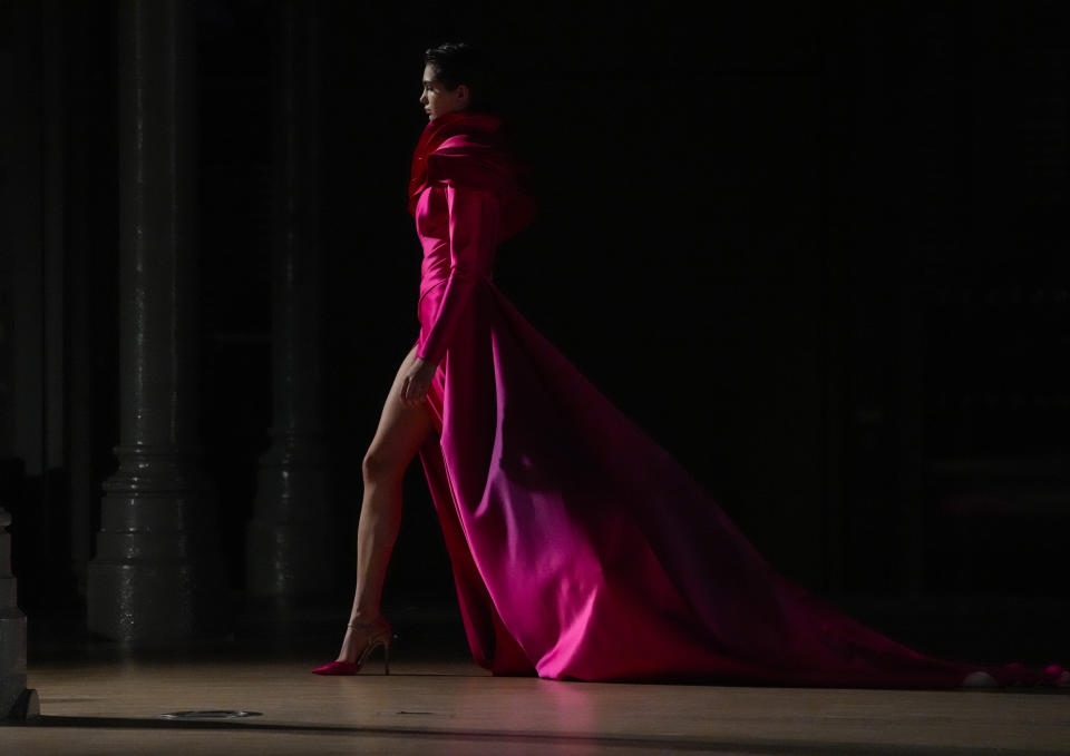 A model wears a creation for the Elie Saab Spring-Summer 2022 Haute Couture fashion collection, in Paris, Wednesday, Jan. 26, 2022. (AP Photo/Francois Mori)