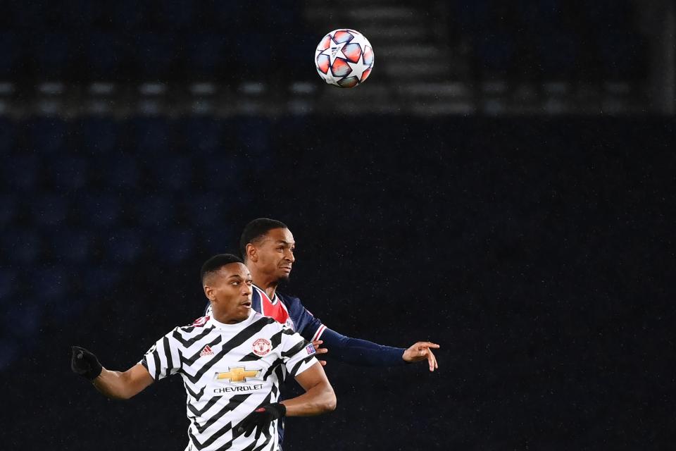 Anthony Martial competes in the air with PSG’s Abdou Diallo (Getty)