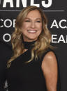 FILE - This Nov. 13, 2019 file photo shows Recording Academy President Deborah Dugan at the Latin Recording Academy Person of the Year gala honoring Juanes in Las Vegas. Dugan has fired back at the Recording Academy with a complaint claiming she was retaliated against after reporting she was subjected to sexual harassment and gender discrimination during her six-month tenure. Lawyers for Dugan, who the academy placed on administrative leave last week, filed a discrimination case with the Equal Employment Opportunity Commission on Tuesday. In the complaint, she claims she was subjected to sexual harassment from the academy’s general counsel. (Photo by Chris Pizzello/Invision/AP, File)
