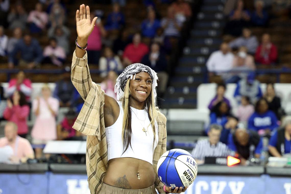 Rhyne Howard waves to the crowd during a halftime presentation at Thursday night’s game in Memorial Coliseum.