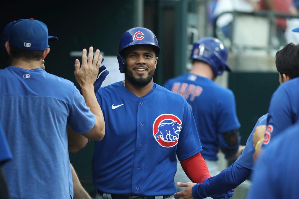 Chicago Cubs third baseman Jeimer Candelario (9) scores against the Detroit Tigers during second-inning action at Comerica Park in Detroit on Monday, Aug. 21, 2023.