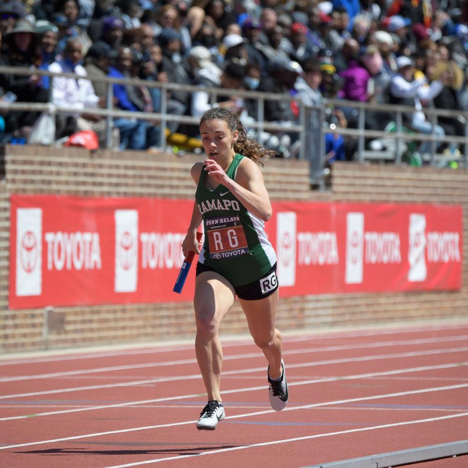 Ramapo's Izzie Anzaldo crosses the finish line in a 4x400 relay Thursday, April 28, 2022 in Philadelphia, Pa. Ramapo placed first in the event.