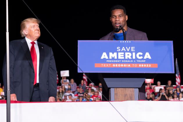 Former President Donald Trump, left, rallies with Georgia Senate candidate Herschel Walker on Sept. 25, 2021. Like Trump, Walker refuses to acknowledge the validity of the 2020 presidential election results. (Photo: Ben Gray/Associated Press)