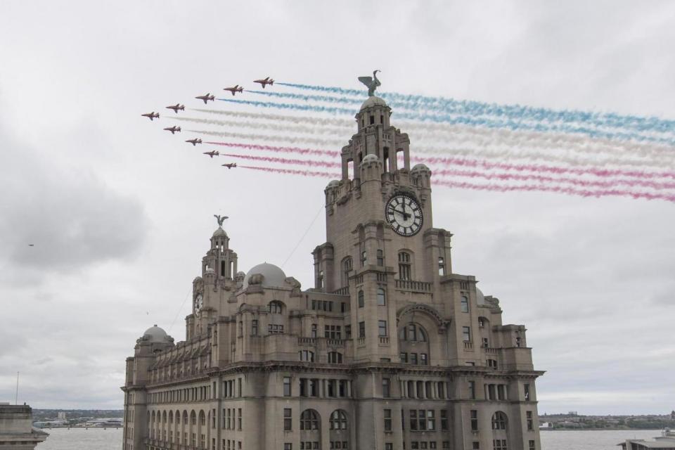 Fly-past: The RAF Red Arrows (EPA)