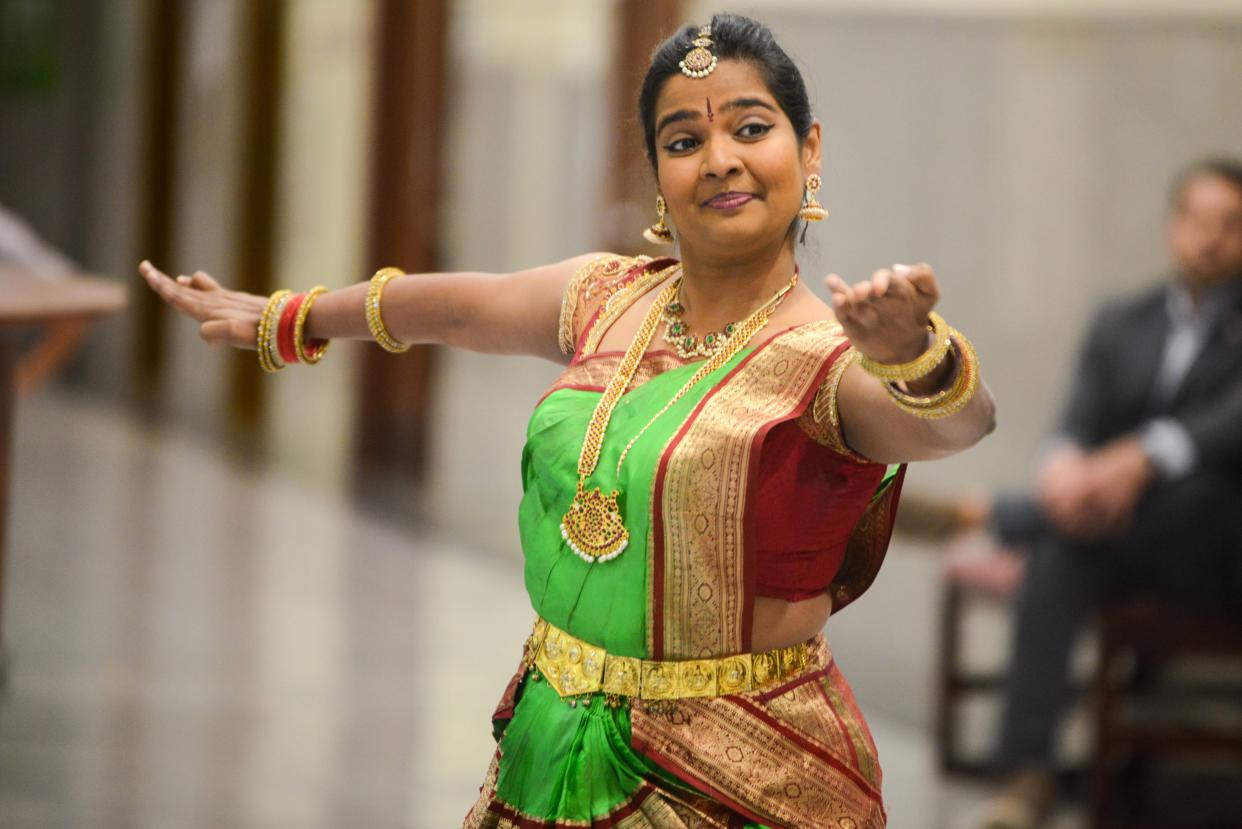 Dr. Nivedita Prasanna performs a dance routine during the AAPI Heritage Month celebration inside Jackson City Hall on Friday, May 3, 2024.
