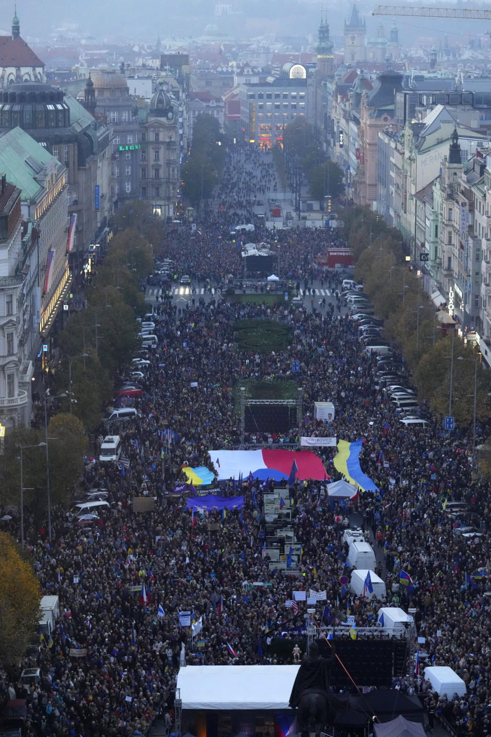 Tens of thousands of people gathers for an anti-war protest in Prague, Czech Republic, Sunday, Oct. 30, 2022. (AP Photo/Petr David Josek)