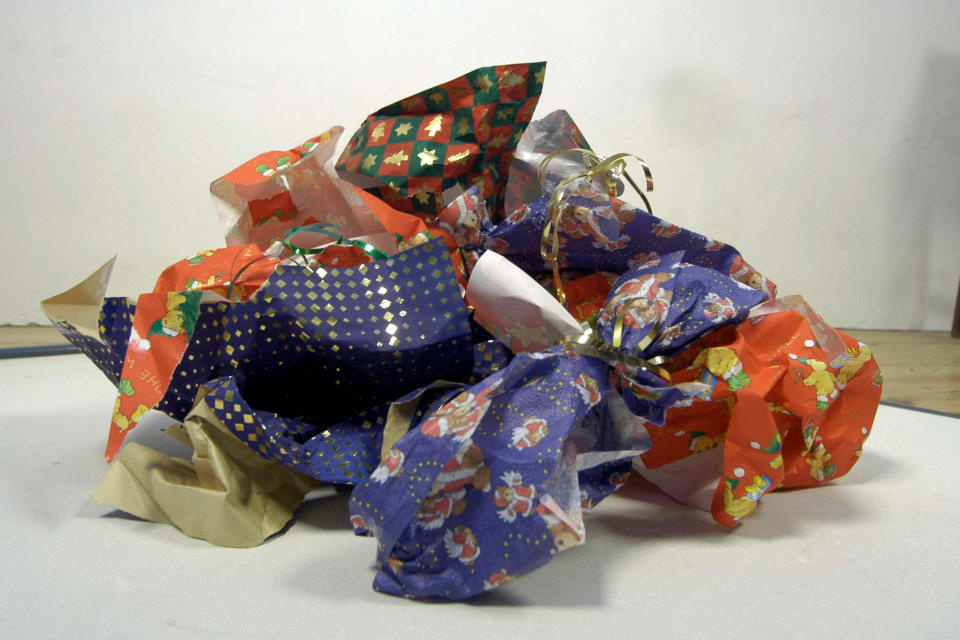 pile of crumpled used wrapping paper