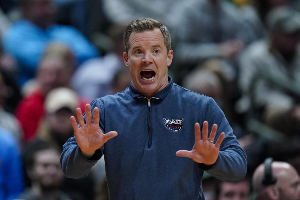 Florida Atlantic head coach Dusty May gestures in the first half of a second-round college basketball game against Fairleigh Dickinson in the men's NCAA Tournament in Columbus, Ohio, Sunday, March 19, 2023. (AP Photo/Michael Conroy)