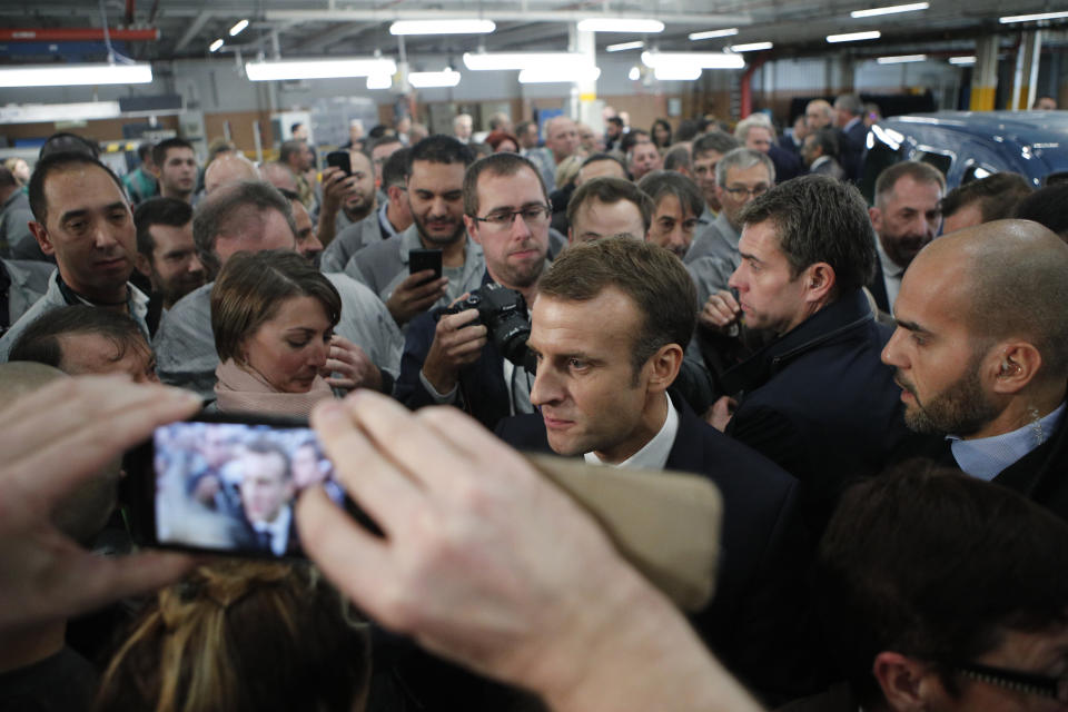French President Emmanuel Macron speaks to workers at the French carmaker Renault factory of Maubeuge, northern France, Thursday, Nov.8, 2018. (AP Photo/Francois Mori)