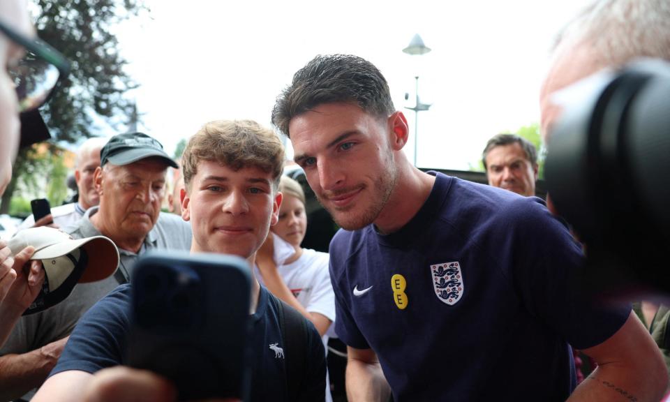 <span>Declan Rice with fans after speaking to the media at England’s Euro 2024 base in Blankenhain.</span><span>Photograph: Lee Smith/Reuters</span>