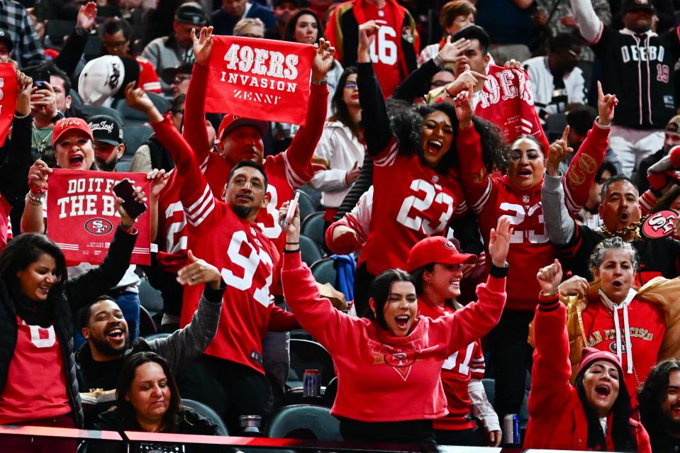 San Francisco 49ers fans cheer in a packed stadium in Las Vegas a week before the Super Bowl.