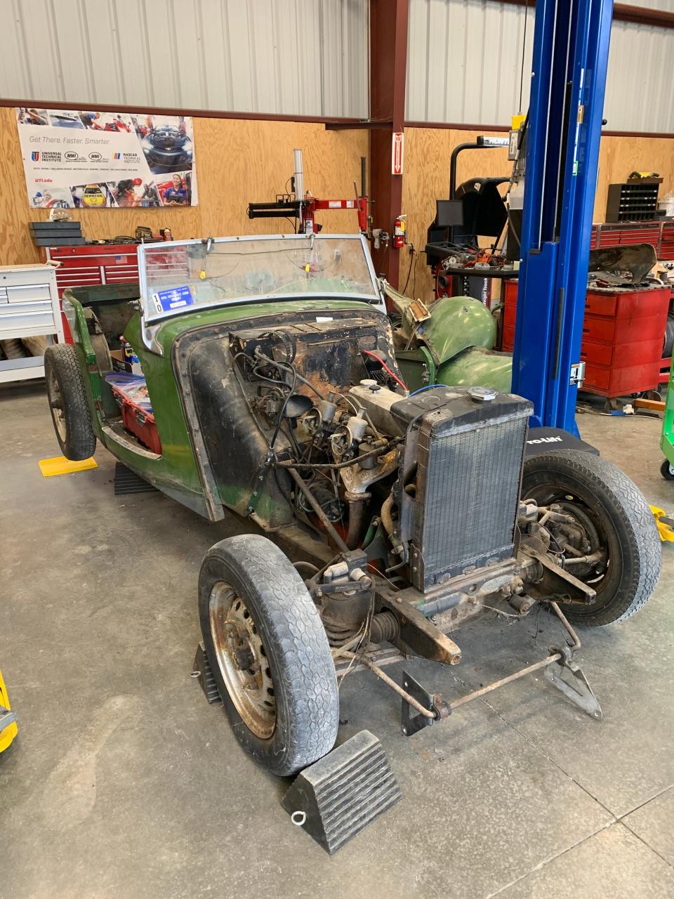 A 1952 MG being worked on at Rancho Cielo, a comprehensive learning and social services center for underserved and disconnected youth in Monterey County, California. The school has launched a program teaching students how to restore classic cars.