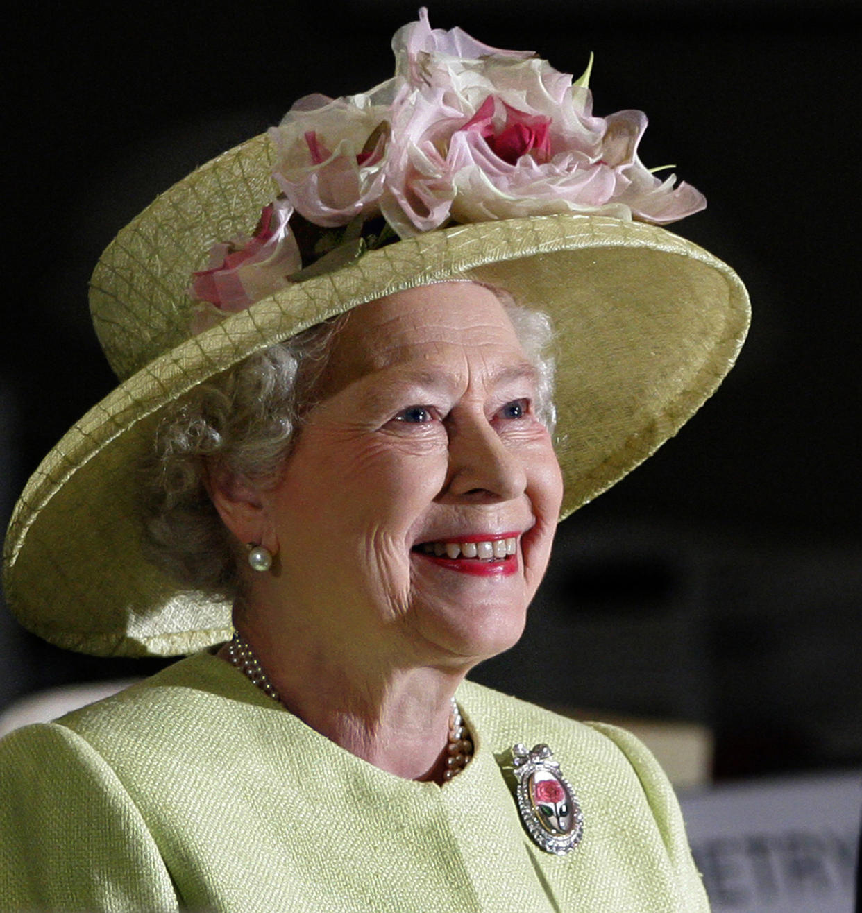 FILE - In this May 8, 2007 file photo, Queen Elizabeth II smiles as she is greeted by astronauts aboard the International Space Station, via video conference, during her visit to NASA's Goddard Flight Center in Greenbelt, Md. Starting Saturday, June 2, 2012, Queen Elizabeth II begins a four-day celebration of her 60 years on the throne.  (AP Photo/J. Scott Applewhite, File)