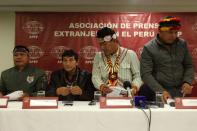 Chiefs of Amazonian tribes, Emerson Sandi, Alfonso Lopez, Aurelio Chino and Carlos Sandi attend a news conference with the foreign media in Lima, August 22, 2017. REUTERS/Guadalupe Pardo