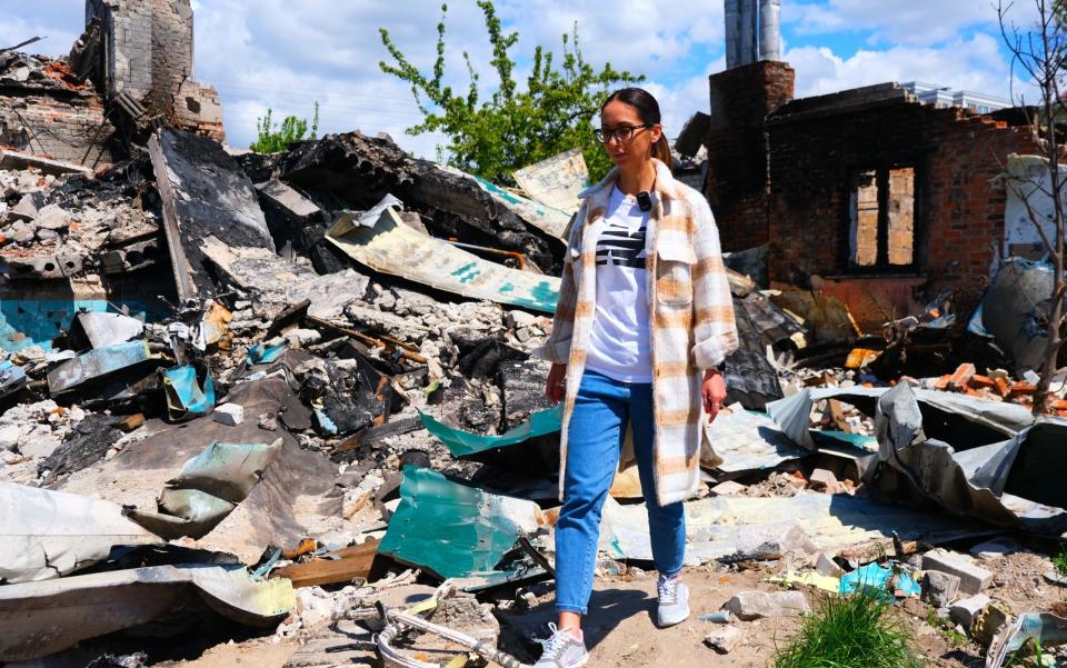 Yuliia Hrebnieva is seen at the crash site of a Russian plane, which was crashed on March 5 over the apartment building of Hrebnieva family in Chernihiv, Ukraine - Anadolu Agency/Anadolu Agency