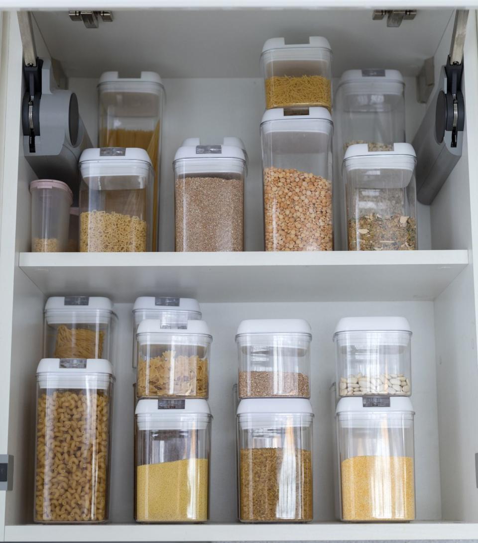how to organize kitchen cabinets stackable containers
