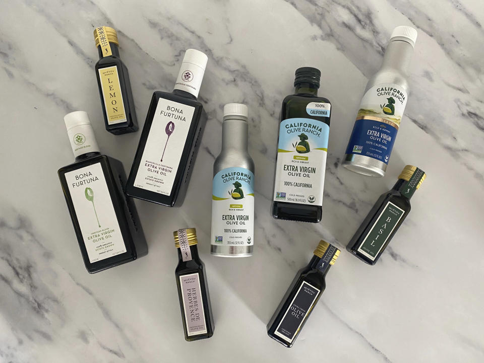 This April 2023 photo shows a variety of olive oils from eco-conscious companies like Bona Furtuna and California Olive Ranch. (Kaie Workman via AP)
