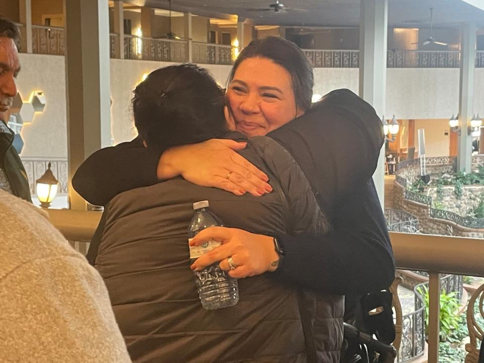 RCMP Const. Heidi Marshall is embraced after her testimony at the Myles Sanderson inquest.