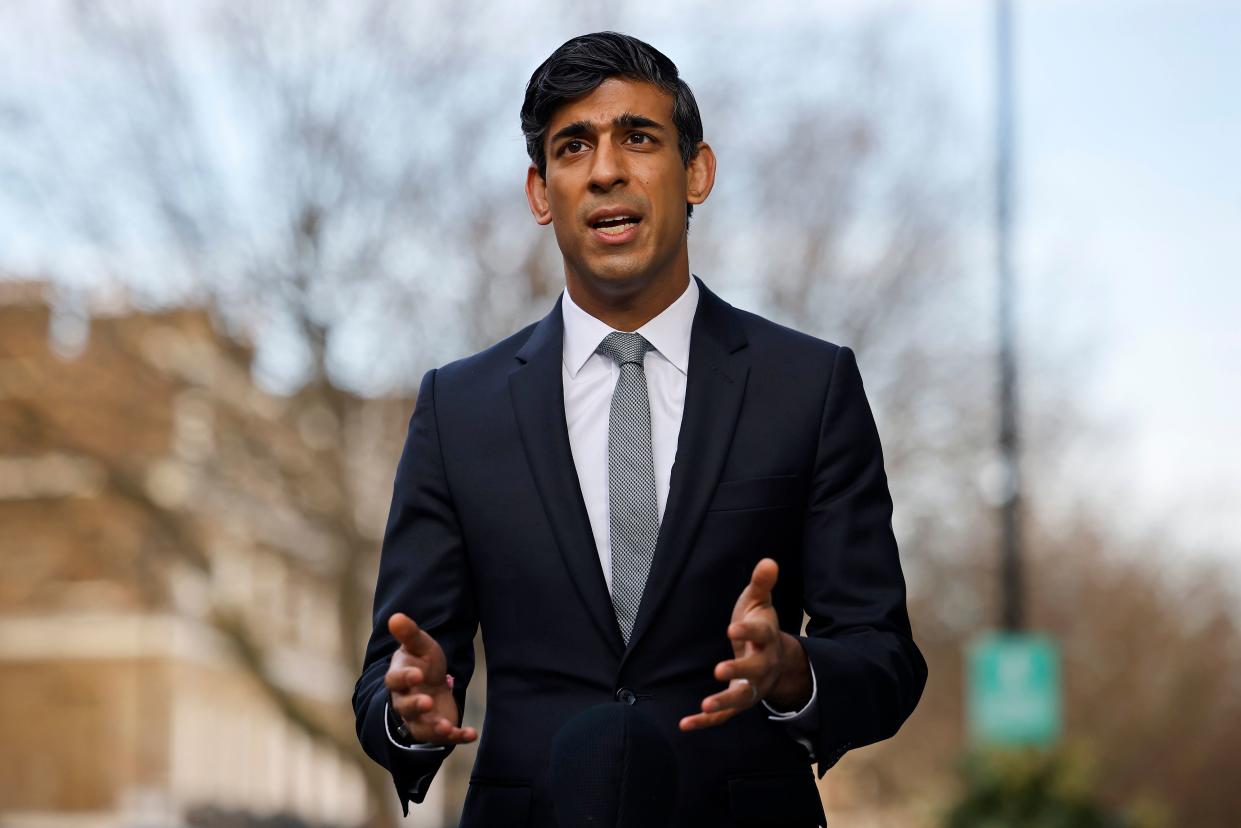 Britain's Chancellor of the Exchequer Rishi Sunak reacts during a media interview after arriving at the BBC in central London on November 22, 2020, to take appear on the BBC political programme The Andrew Marr Show. - Britain's debt is now at its highest level since 1961 as a share of GDP, after the government embarked on a massive spending spree to mitigate the economic effects of the COVID-19 coronavirus pandemic and resulting lockdowns. (Photo by Tolga Akmen / AFP) (Photo by TOLGA AKMEN/AFP via Getty Images)