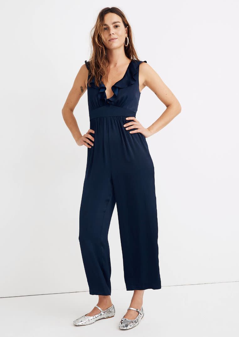 For the more minimalists among us, this satin jumpsuit with a ruffly neckline is a sexy option for a holiday party. <a href="https://fave.co/2LKdHC7" target="_blank" rel="noopener noreferrer"><strong>Get it for $145, plus an additional 25% off with code GOODCHEER for a limited time, at Madewell</strong></a>.