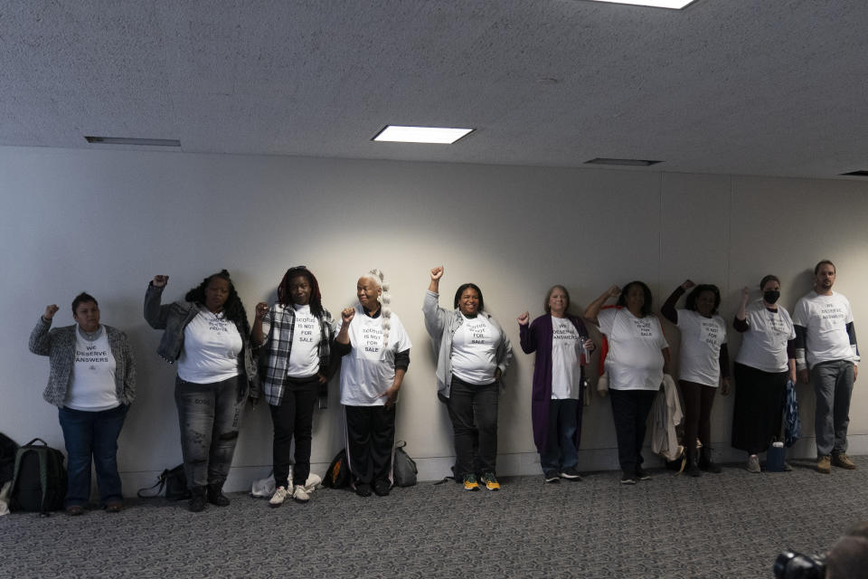 Activists with the Center for Popular Democracy Action stand outside a mark up business meeting of the Senate Judiciary Committee, on Capitol Hill, Thursday, Nov. 9, 2023, in Washington. (AP Photo/Alex Brandon)