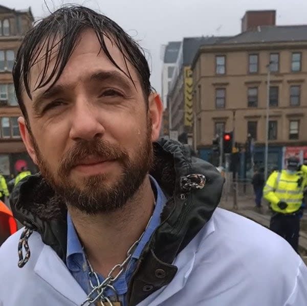 Aaron Thierry of Cardiff University, who is a climate academic and activist at a XR protest