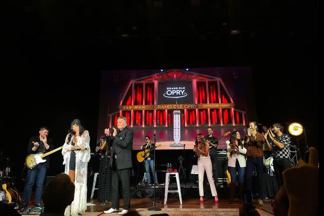 <p>Grande Ole Opry/Instagram</p> Bill Anderson asks Sara Evans to join the Grand Ole Opry on Aug. 17, 2023