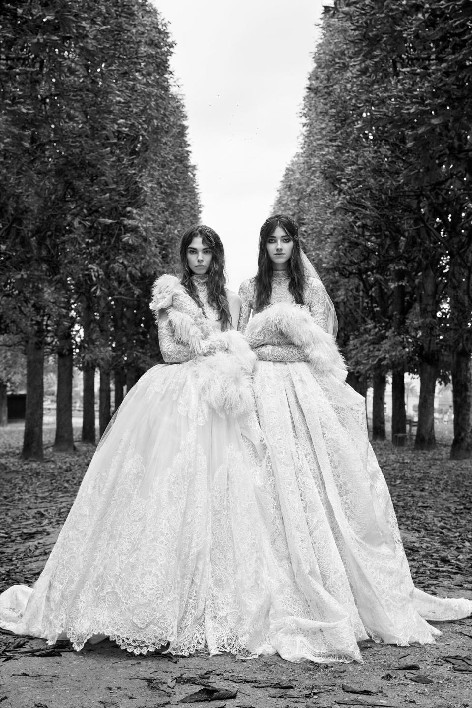 <p><i>From left, long-sleeve macramé lace ball gown with high-neck accent and couture hand-draped skirt; long-sleeve ball gown with macramé lace panels. (Photo: Courtesy of Vera Wang/Patrick Demarchelier) </i></p>