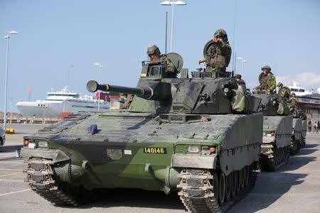 Swedish armoured personnel carriers are seen in Visby harbour, island of Gotland, Sweden September 14, 2016. TT News Agency/ Soren Andersson/ via REUTERS