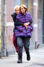 Anwar Hadid and Dua Lipa stay cozy on Wednesday during a walk around the SoHo neighborhood of N.Y.C.