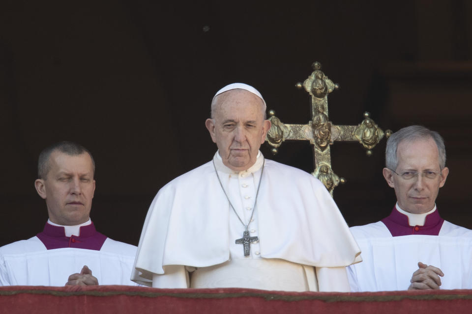 Pope Francis looks at the crowd after he delivered the Urbi et Orbi (Latin for 'to the city and to the world' ) Christmas' day blessing from the main balcony of St. Peter's Basilica at the Vatican, Wednesday, Dec. 25, 2019. (AP Photo/Alessandra Tarantino)