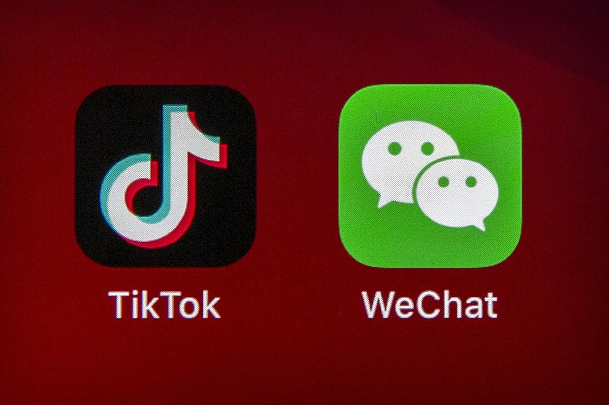 <span class="caption">Banning TikTok and WeChat would cut off many Americans from popular social media.</span> <span class="attribution"><a class="link " href="https://newsroom.ap.org/detail/ChinaUSTrumpTiktokWechatOrder/7f2007a5786340f89657a9aac86d826a/photo?Query=TikTok%20AND%20WeChat&mediaType=photo&sortBy=&dateRange=Anytime&totalCount=19&currentItemNo=3" rel="nofollow noopener" target="_blank" data-ylk="slk:AP Photo/Mark Schiefelbein;elm:context_link;itc:0;sec:content-canvas">AP Photo/Mark Schiefelbein</a></span>