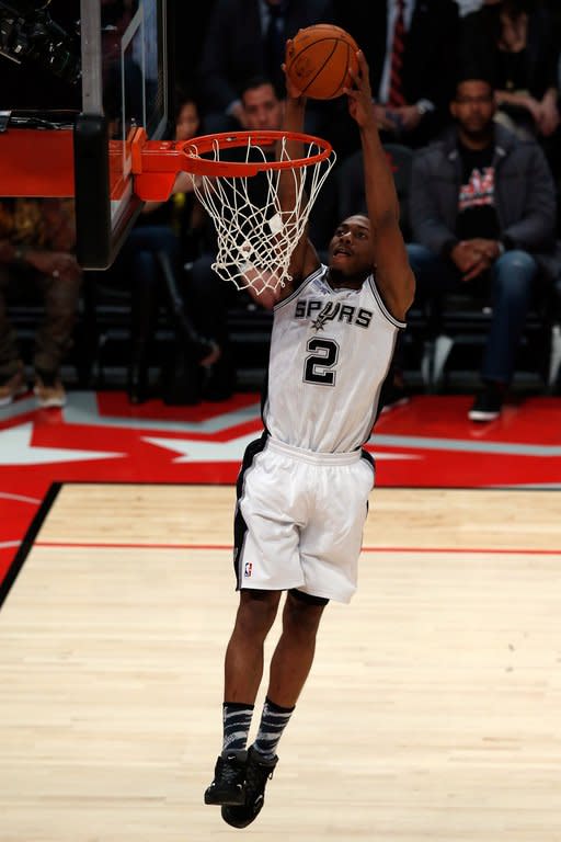 Kawhi Leonard of the San Antonio Spurs and Team Chuck dunks the ball in the first half in the BBVA Rising Stars Challenge 2013, part of the 2013 NBA All-Star Weekend, at the Toyota Center in Houston, Texas, on February 15, 2013