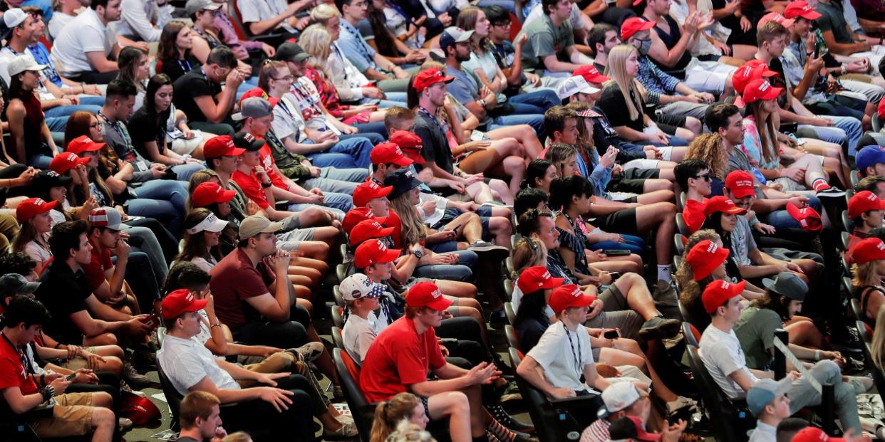 Young people listen to U.S. President Donald Trump as he delivers an "Address to Young Americans" at the Dream City Church in Phoenix, Arizona, U.S., June 23, 2020.