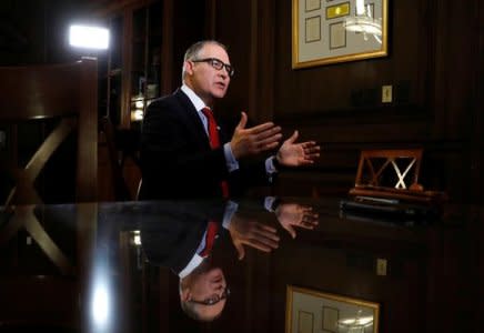 FILE PHOTO - Environmental Protection Agency Administrator Scott Pruitt speaks during an interview with Reuters journalists in Washington, U.S., January 9, 2018.  REUTERS/Kevin Lamarque