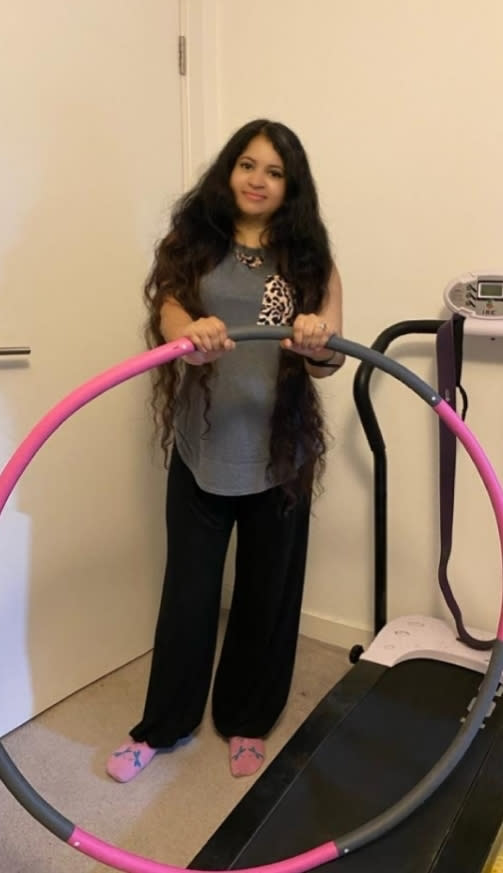 Suswati Basu starts every day with a hula hoop session before breakfast. (Supplied)